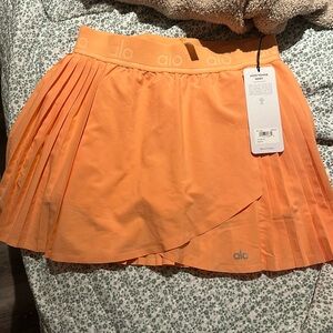 ALO Yoga Orange Pleated Skirt